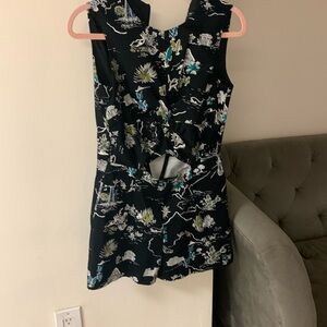 Small Zara romper with cut out in the middle.
